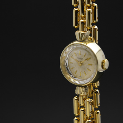 チュードル アンティークウオッチ プリズム風防 金色ケース 手巻き レディース