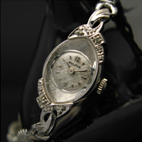 ブローバ レディースアンティークウオッチ アーモンドケース しぼりメッシュベルト