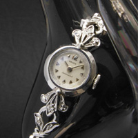 グリュエン コンチネンタル デザインラグ スモールラウンドケース 10KGF レディースアンティークウオッチ