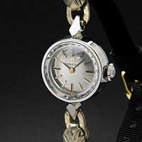 オメガ レディースアンティークウオッチ シルバーダイアル＆ゴールドインデックス プリズム風防